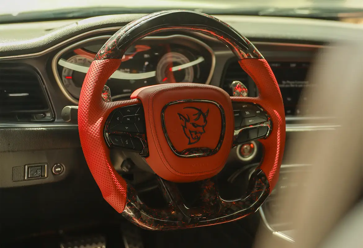 Ferrari custom carbon fiber steering wheel by Miami Carbon Designs