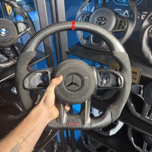 AMG black Alcantara red stitching custom carbon fiber steering wheel by Miami Carbon Designs