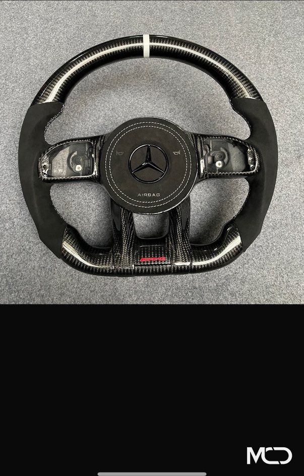 Black alcantara, Gloss carbon, White centerline Mercedes AMG steering wheel by Miami Carbon Designs