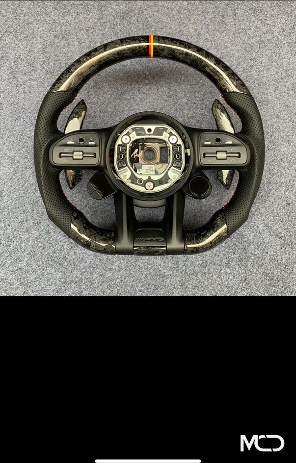 Black perforated leather, Forged carbon, German flag stripe Mercedes AMG steering wheel by Miami Carbon Designs