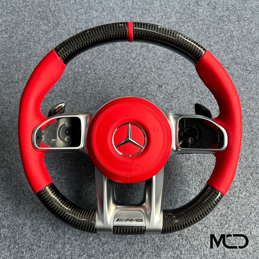 Mercedes AMG steering wheel in red leather with gloss carbon fiber by Miami Carbon Designs