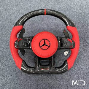 AMG red perforated red airbag cover custom carbon fiber steering wheel by Miami Carbon Designs