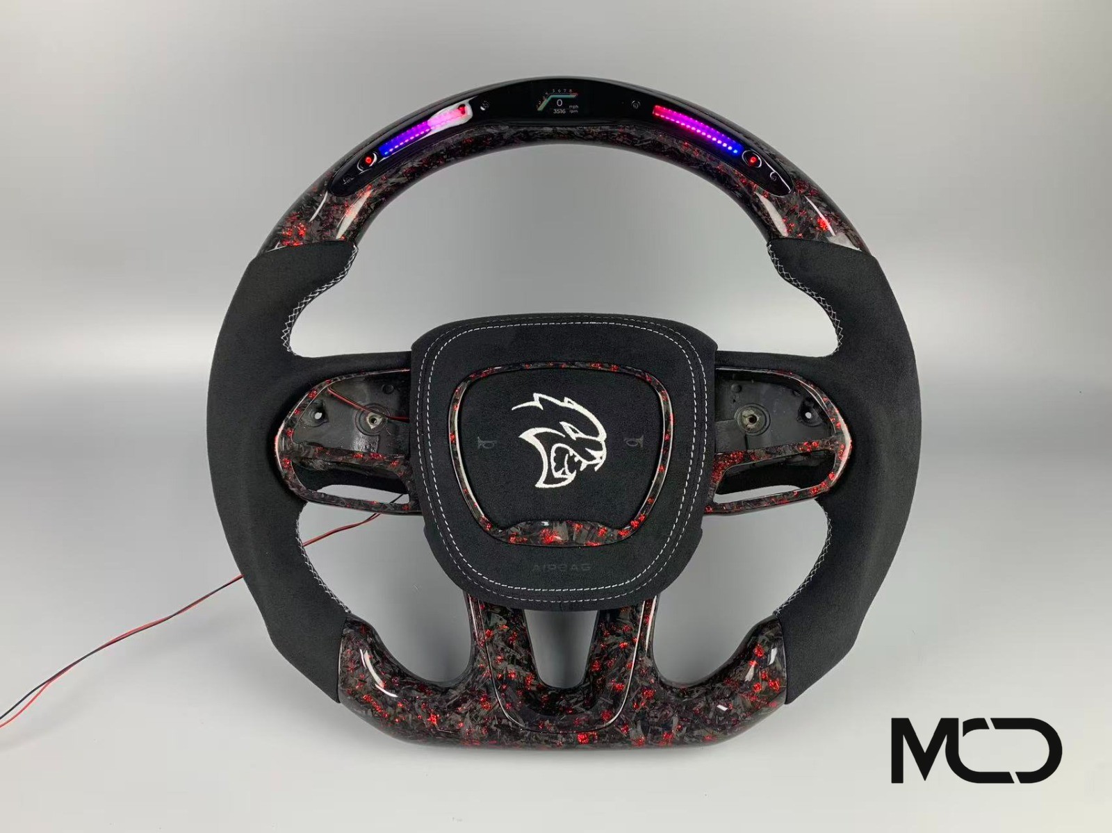 Dodge Hellcat steering wheel in black alcantara with red flake forged carbon and LED shift display by Miami Carbon Designs