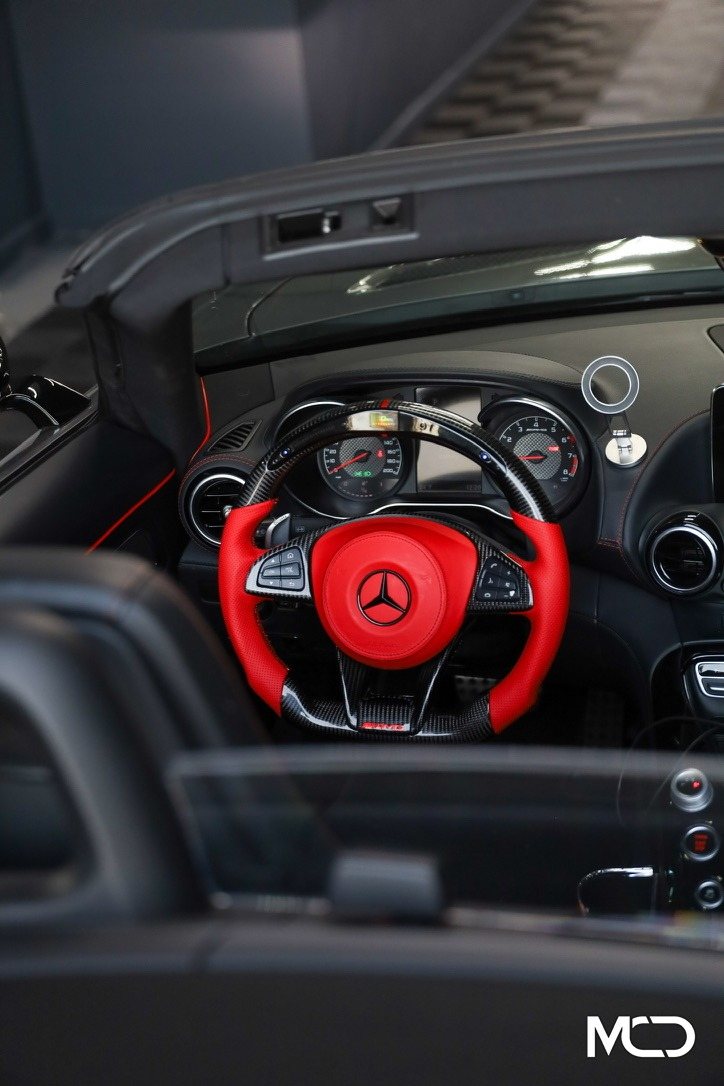Mercedes AMG GT steering wheel in red leather with gloss carbon fiber by Miami Carbon Designs
