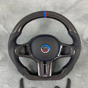 BMW G series custom gloss carbon fiber steering wheel with black perforated leather, M tricolor stripe and blue stitching by Miami Carbon Designs