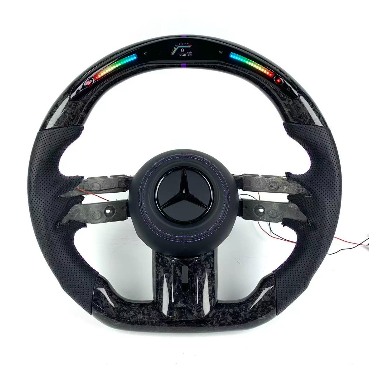 Mercedes 2024 custom forged carbon fiber steering wheel with black perforated leather, purple stitching and LED display by Miami Carbon Designs