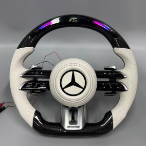 Mercedes AMG 2024 custom gloss carbon fiber steering wheel in white perforated leather with LED display by Miami Carbon Designs
