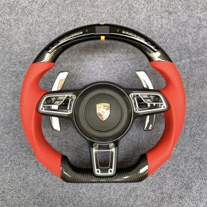 Porsche 991 and 718 custom carbon fiber steering wheel in red perforated leather with LED shift display by Miami Carbon Designs