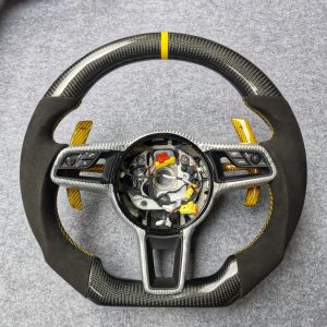 Porsche 991 custom gloss carbon fiber steering wheel with black Alcantara, yellow centerline, gold paddles and silver carbon trim by Miami Carbon Designs
