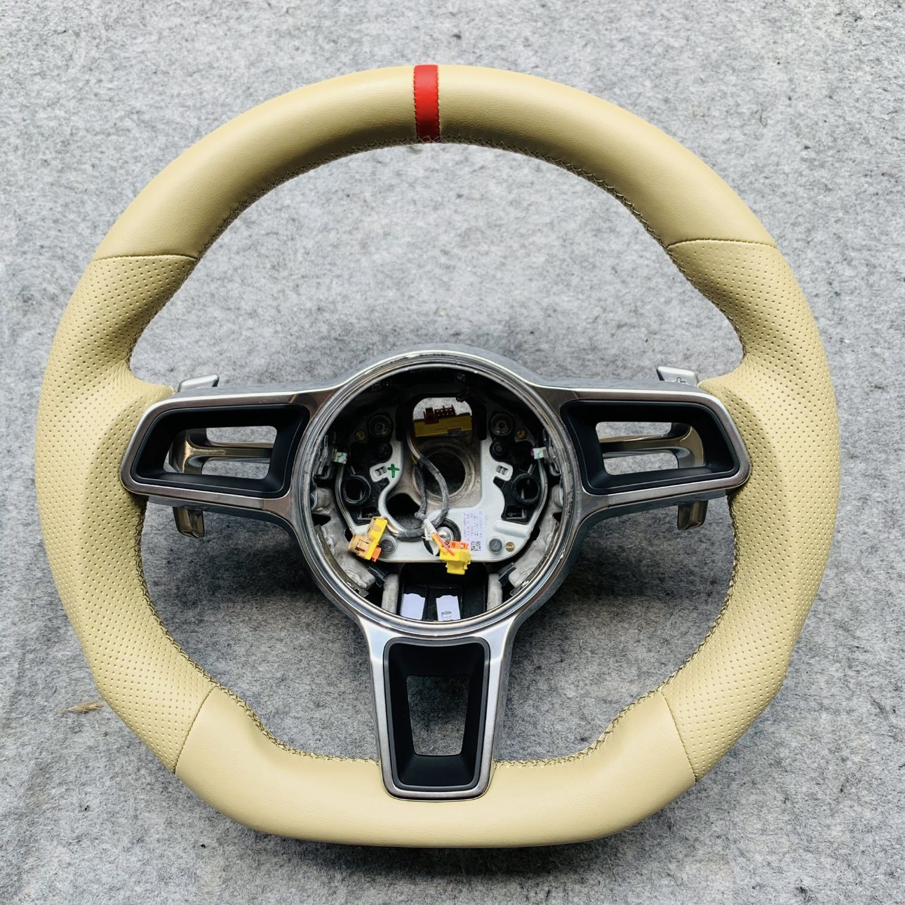 Porsche custom steering wheel in cream perforated leather with red centerline by Miami Carbon Designs