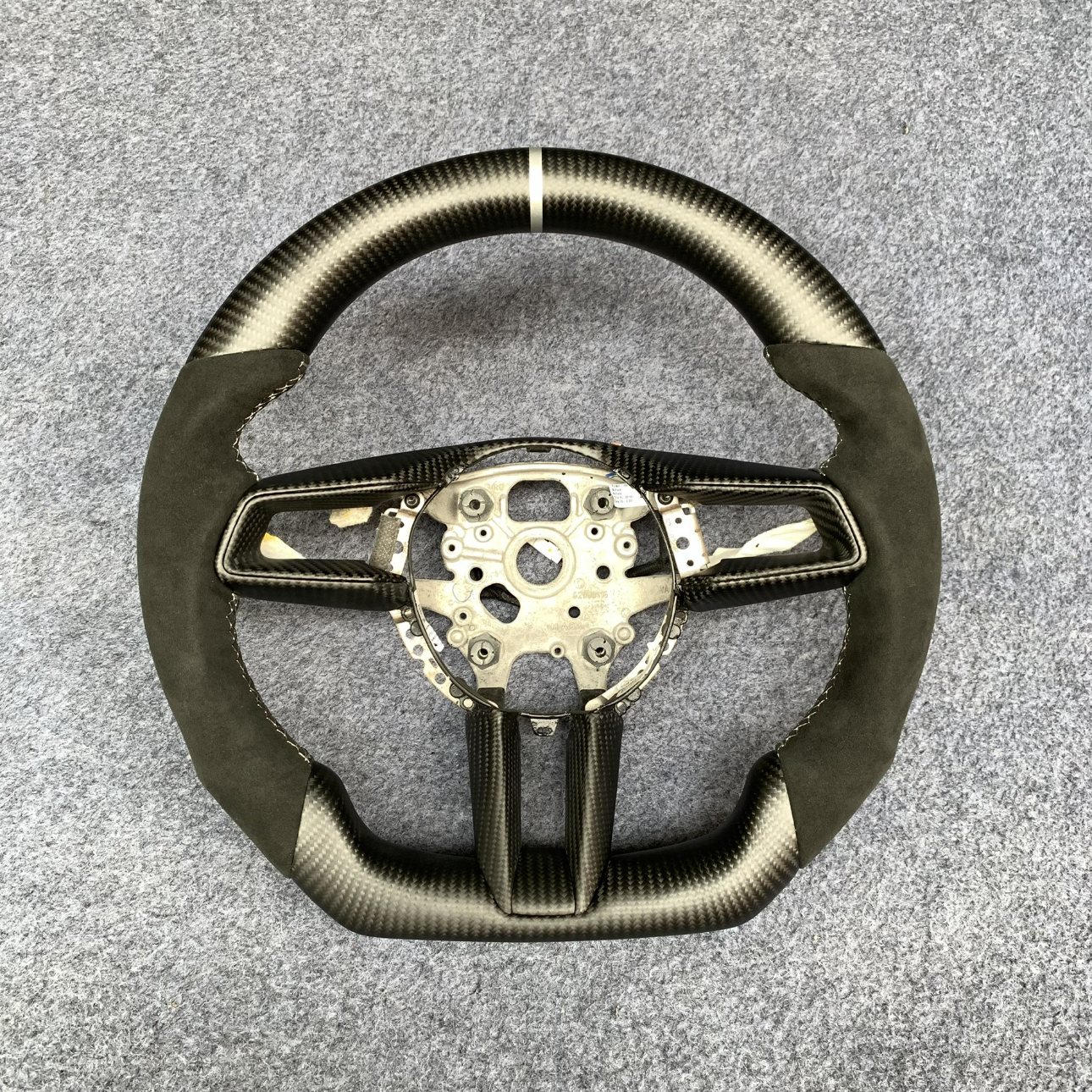 Porsche custom matte carbon fiber steering wheel with black Alcantara and white centerline by Miami Carbon Designs