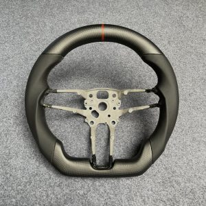 Porsche custom matte carbon fiber steering wheel with black leather and orange centerline by Miami Carbon Designs